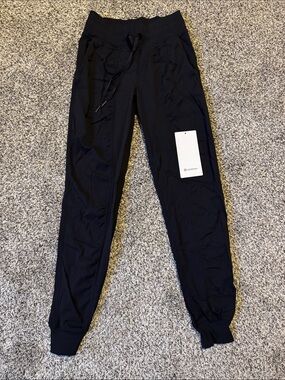 lululemon black activewear pants with logo tag